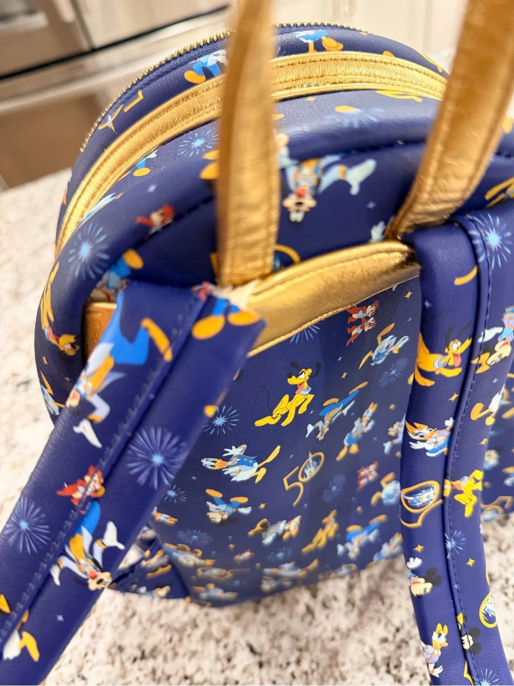 Loungefly Navy and Gold Disney Parks 50th Anniversary Backpack